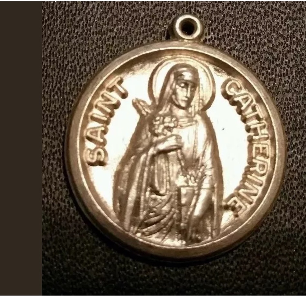 Antique Sterling Silver Saint Catherine Pendant